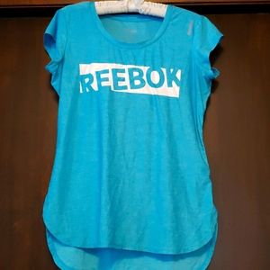 Medium light blue reebok tshirt